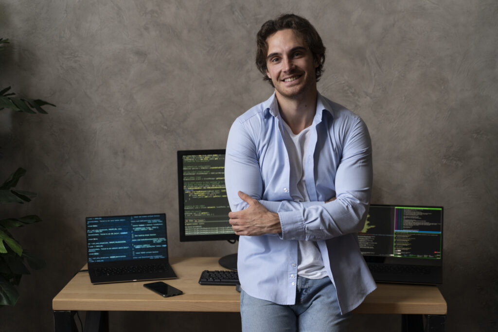 Medium shot smiley programmer indoors